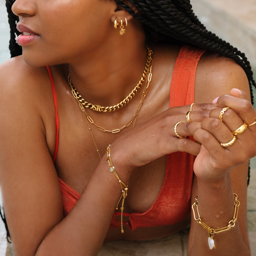 Sterling Silver Crystal Huggie Hoop Earrings (Gold)