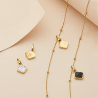 Black Enamel Clover Pendant (Gold)