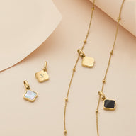 Black Enamel Clover Pendant (Gold)