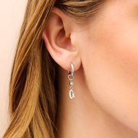 Gemma Owen GXO Initial Huggie Charm Earrings (Silver)